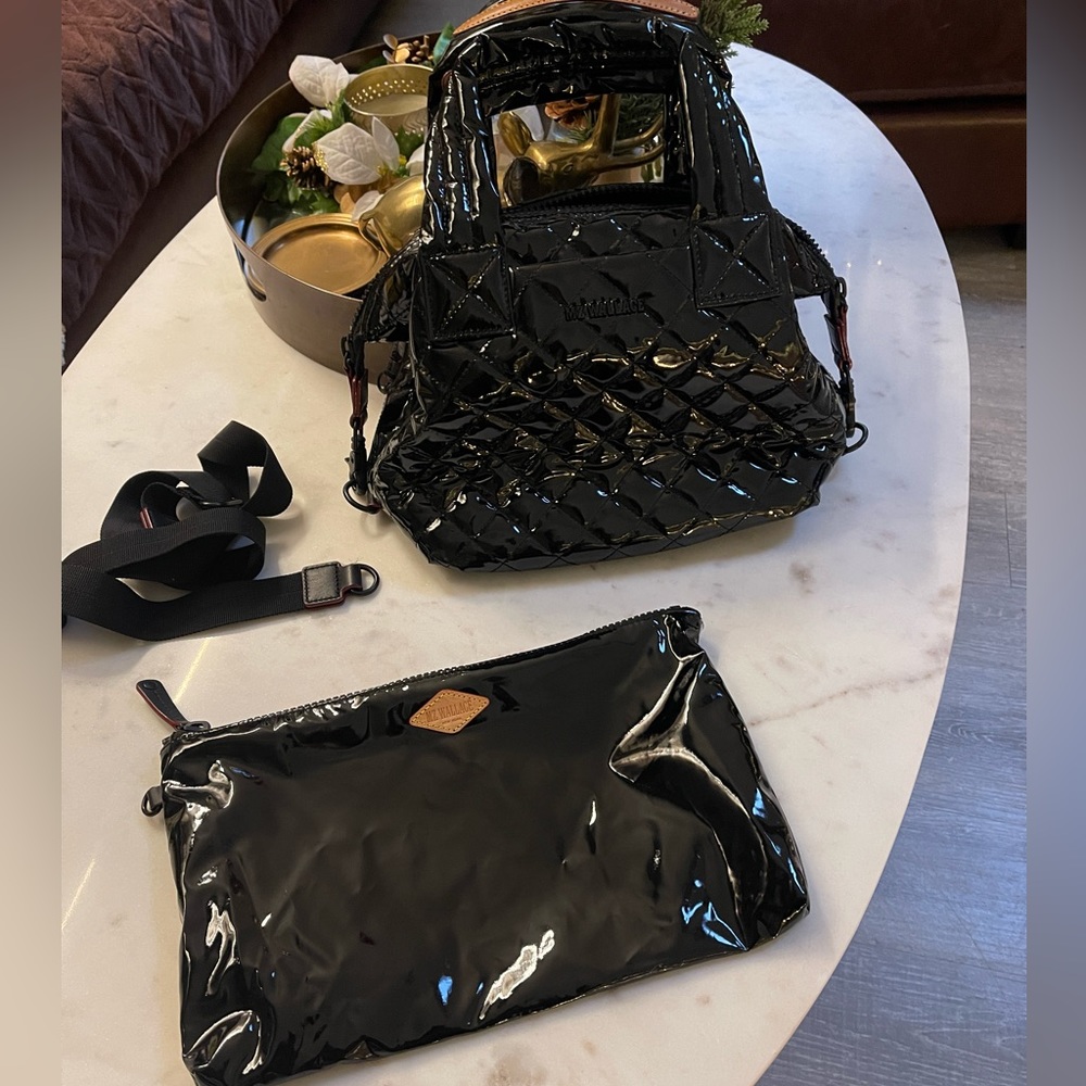 Used only twice beautiful bag. No scratches or tears. Excellent condition.